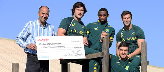 Kolisi, Boks make donation in PE